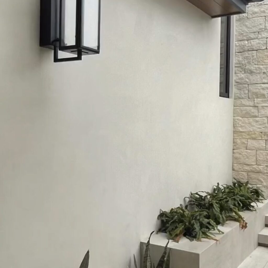 Shows stucco exterior wall of home
