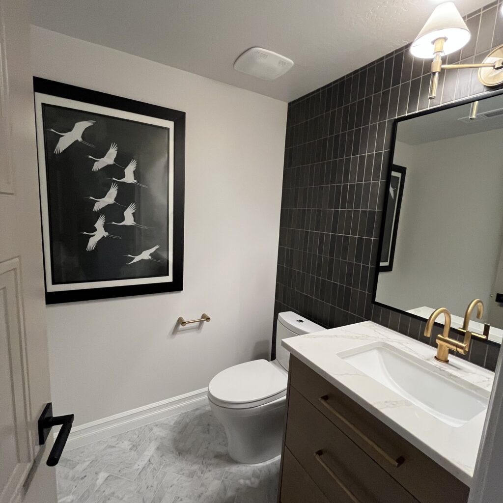 Shows small, newly remodeled 1/2 bathroom